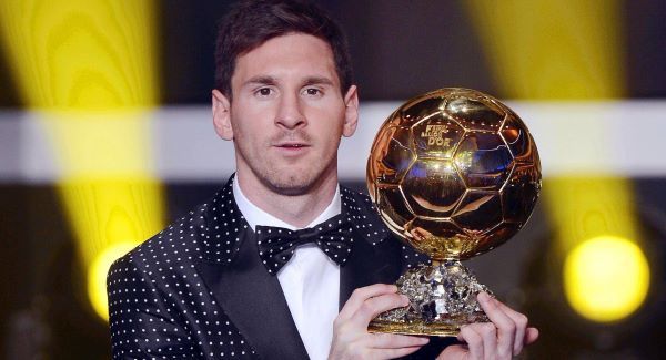 Lionel Messi poses with his Ballon d'Or trophy. Picture: AP